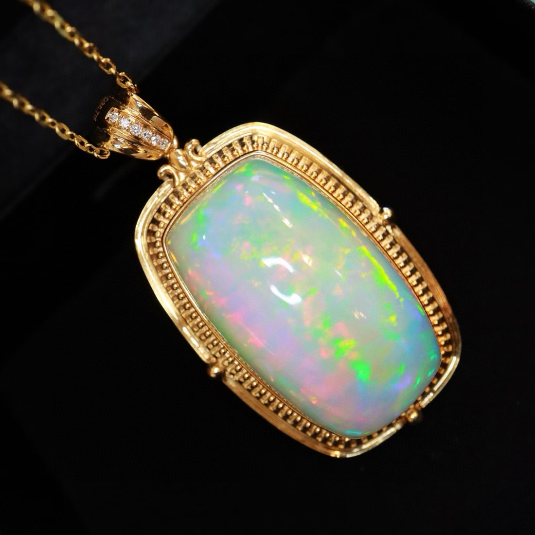 14k Gold 36.73 Ctw Natural Opal & Diamond Pendant( Without Chain ): Ref:231020448 // gold content:14k gold // main gemstone:opal // shape:cushion // carat weight:36. 7ct // color:white // treatment:natural // // adjacent gemstone 2 : diamond // shape:round // carat we