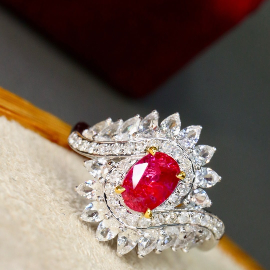 14k Gold 1.08 Ctw Natural Ruby & Diamond Ring: Ref:231029015 // gold content:14k gold // ring size:7. 25us // // main gemstone:ruby // shape:oval // carat weight:0. 84ct // color:red // treatment:natural // // adjacent gemstone 2 : diamond //