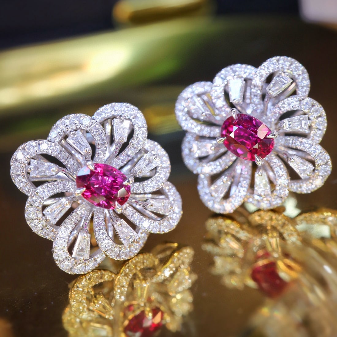 14k Gold 2.26 Ctw Natural Ruby & Diamond Earrings: Ref:231029019 // gold content:14k gold // main gemstone:ruby // shape:oval // carat weight:1. 2ct // color:red // treatment:natural // // adjacent gemstone 2 : diamond // shape:multiply // carat weigh