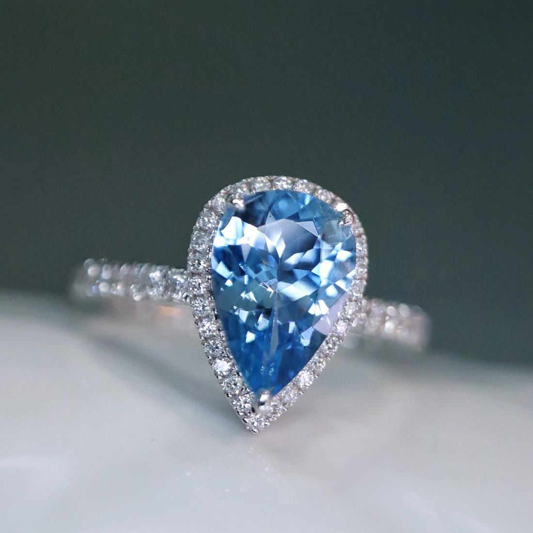 14k Gold 1.49 Ctw Natural Aquamarine & Diamond Ring: Ref:231029044 // gold content:14k gold // ring size:7. 25us // // main gemstone:aquamarine // shape:pear // carat weight:1. 2ct // color:blue // treatment:natural // // adjacent gemstone 2 : diamond
