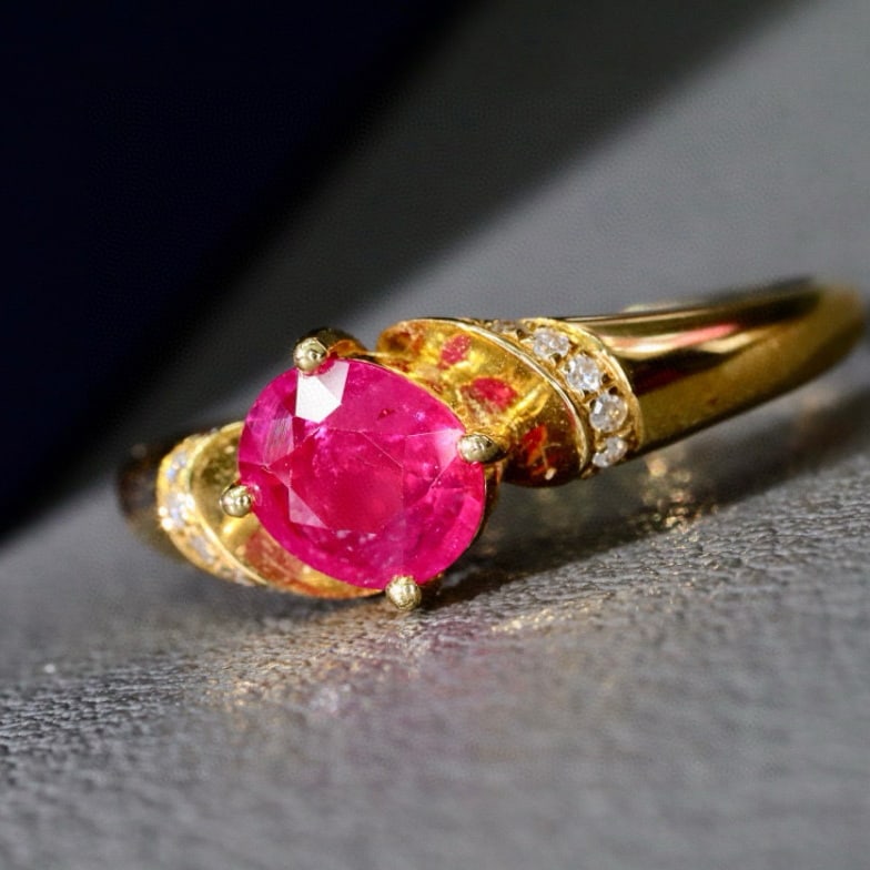 14k Gold 0.80 Ctw Natural Ruby & Diamond Ring: Ref:231029055 // gold content:14k gold // ring size:7. 25us // // main gemstone:ruby // shape:oval // carat weight:0. 75ct // color:red // treatment:natural // // adjacent gemstone 2 : diamond //