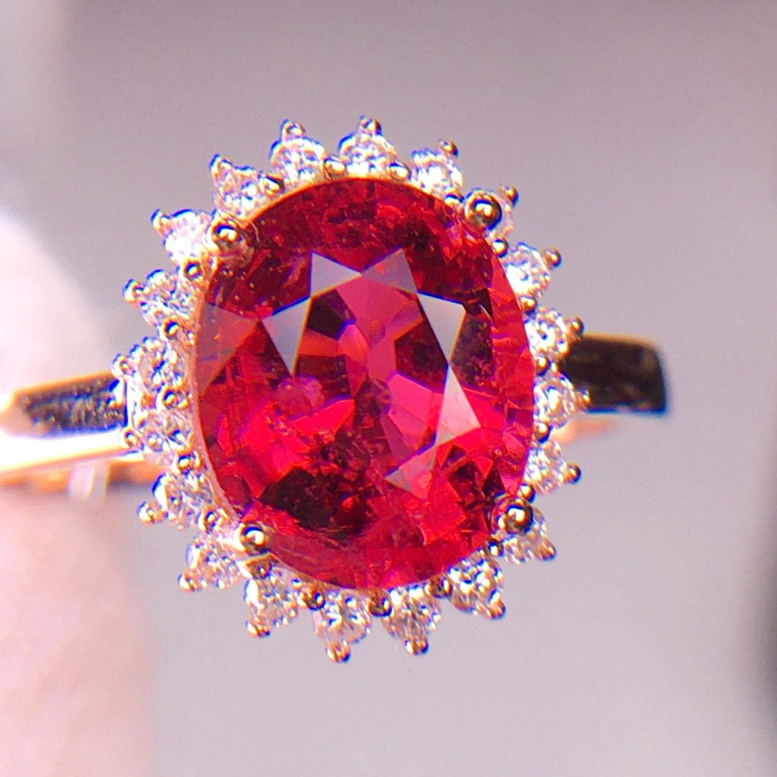 14k Gold 2.85 Ct Natural Tourmaline & Diamond Ring: Ref:231029058 // gold content:14k gold // ring size:7. 25us // // main gemstone:tourmaline // shape:oval // carat weight:2. 85ct // color:red // treatment:natural // // adjacent gemstone 2 : diamond
