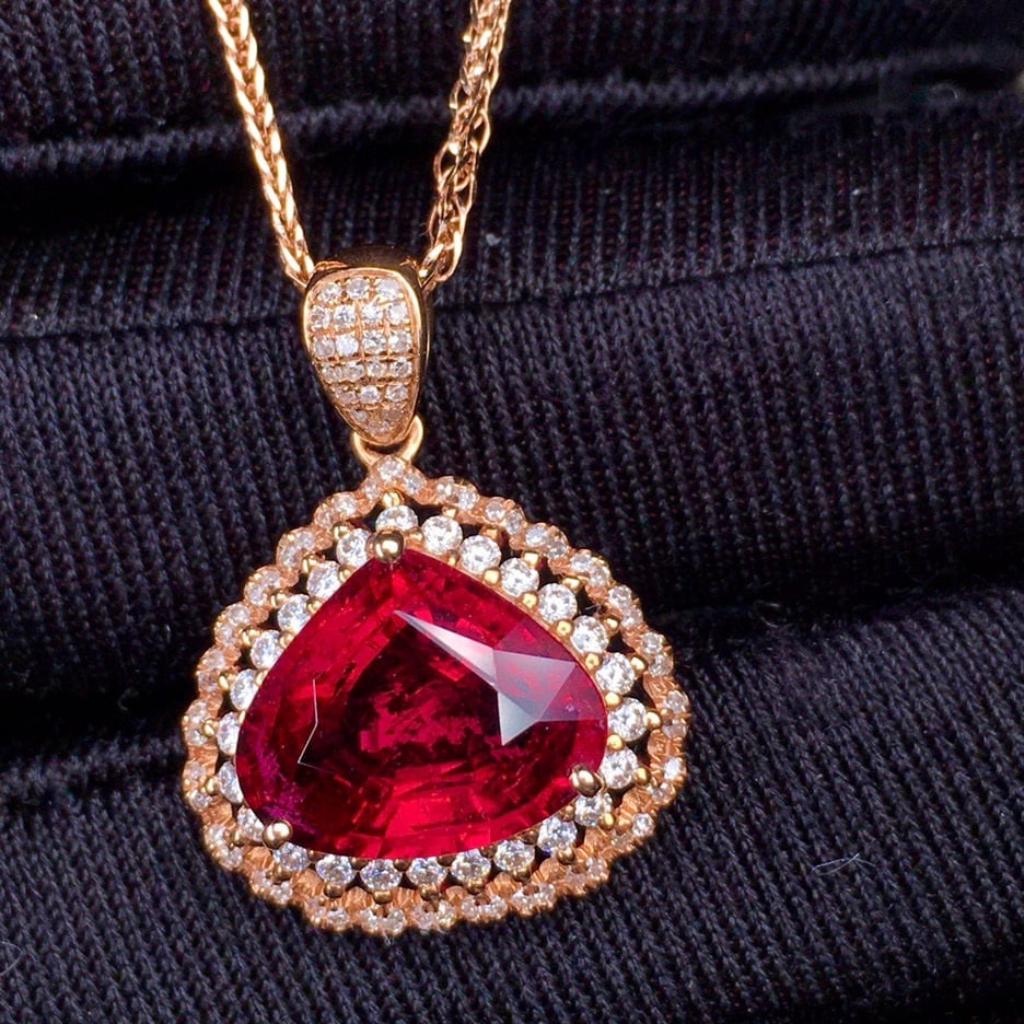 14k Gold 4.3 Ct Natural Tourmaline & Diamond Pendant( Without Chain ): Ref:231029063 // gold content:14k gold // main gemstone:tourmaline // shape:pear // carat weight:4. 3ct // color:red // treatment:natural // // adjacent gemstone 2 : diamond // shape:round // clarity