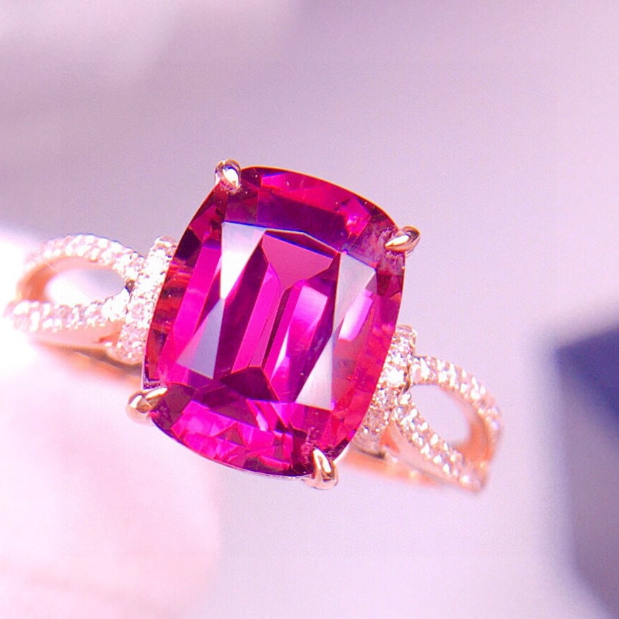 14k Gold 3.1 Ct Natural Tourmaline & Diamond Ring: Ref:231029077 // gold content:14k gold // ring size:7. 25us // // main gemstone:tourmaline // shape:cushion // carat weight:3. 1ct // color:reddish pink // treatment:natural // // adjacent gemstone 2