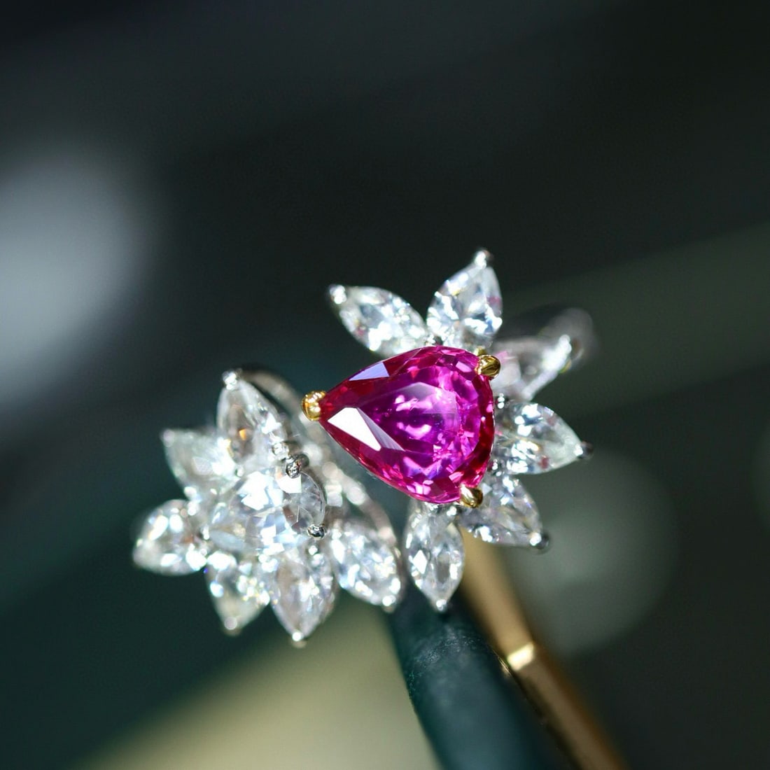 14k Gold 1.11 Ctw Natural Ruby & Diamond Ring: Ref:231029099 // gold content:14k gold // ring size:7. 25us // // main gemstone:ruby // shape:pear // carat weight:1. 03ct // color:purplish red // treatment:natural // // adjacent gemstone 2 :