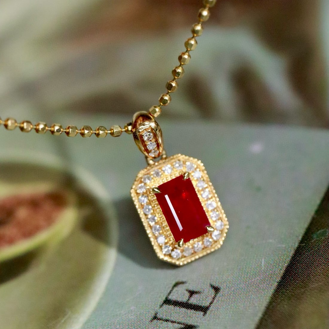14k Gold 0.50 Ctw Natural Ruby & Diamond Pendant( Without Chain ): Ref:231029105 // gold content:14k gold // main gemstone:ruby // shape:emerald // carat weight:0. 43ct // color:red // treatment:natural // cut grade:g // // adjacent gemstone 2 : diamond //
