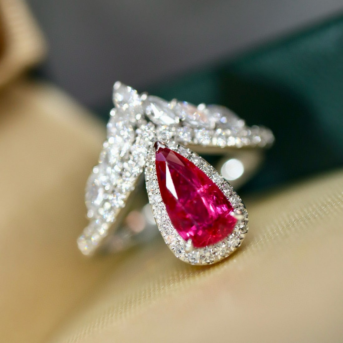 14k Gold 1.32 Ctw Natural Ruby & Diamond Ring: Ref:231029108 // gold content:14k gold // ring size:7. 25us // // main gemstone:ruby // shape:pear // carat weight:1. 01ct // color:red // treatment:natural // cut grade:g // // adjacent gemstone 2 : 