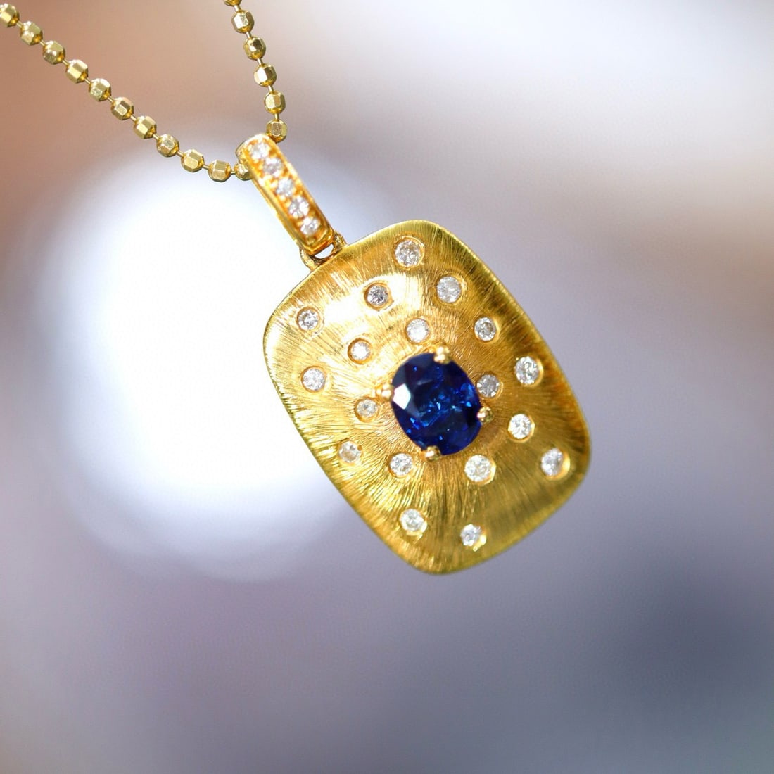 14k Gold 0.47 Ctw Natural Sapphire & Diamond Pendant( Without Chain ): Ref:231029110 // gold content:14k gold // main gemstone:sapphire // shape:oval // carat weight:0. 35ct // color:blue // treatment:natural // cut grade:g // // adjacent gemstone 2 : diamond //