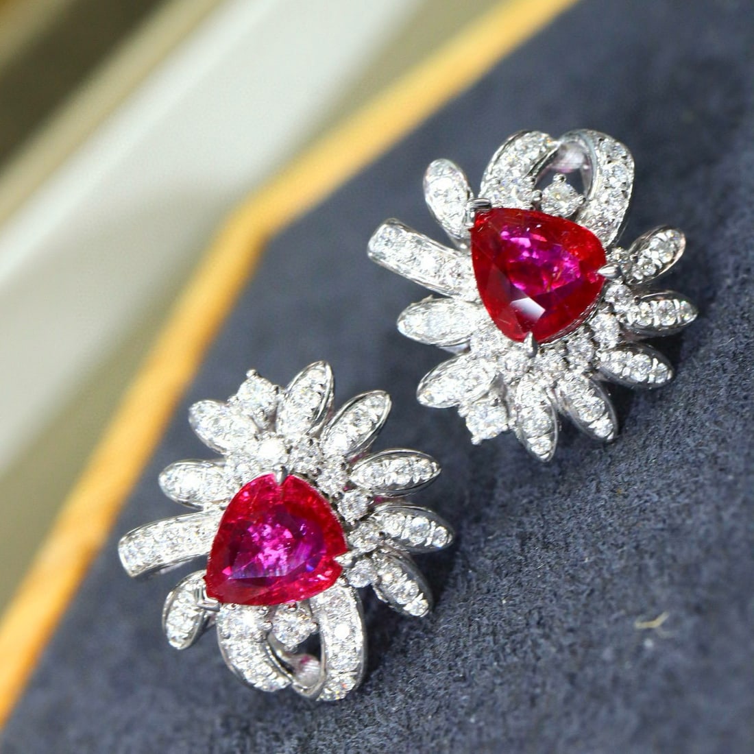 14k Gold 2.65 Ctw Natural Ruby & Diamond Earrings: Ref:231029133 // gold content:14k gold // main gemstone:ruby // shape:pear // carat weight:2. 03ct // clarity grade:vs-si // color:red // treatment:natural // cut grade:g // // adjacent gemstone 2 :