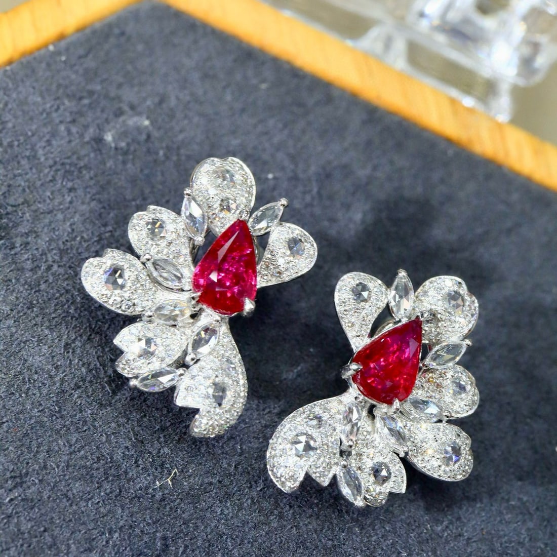 14k Gold 3.50 Ctw Natural Ruby & Diamond Earrings: Ref:231029134 // gold content:14k gold // main gemstone:ruby // shape:pear // carat weight:2. 04ct // clarity grade:vs-si // color:red // treatment:natural // cut grade:g // // adjacent gemstone 2 :