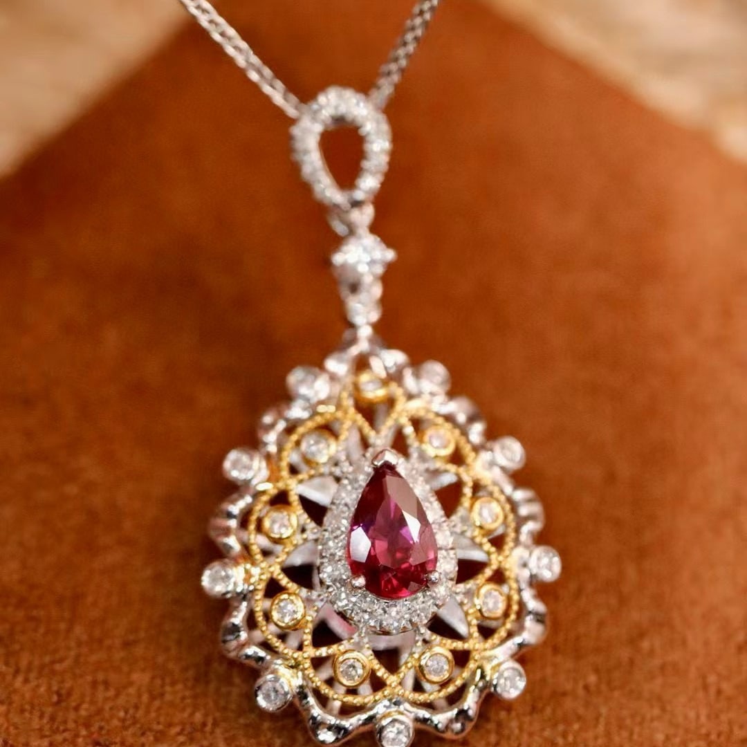 14k Gold 0.72 Ctw Natural Ruby & Diamond Pendant( Without Chain ): Ref:231029137 // gold content:14k gold // main gemstone:ruby // shape:pear // carat weight:0. 50ct // clarity grade:vs-si // color:red // treatment:natural // cut grade:g // // adjacent gemstone 2 :