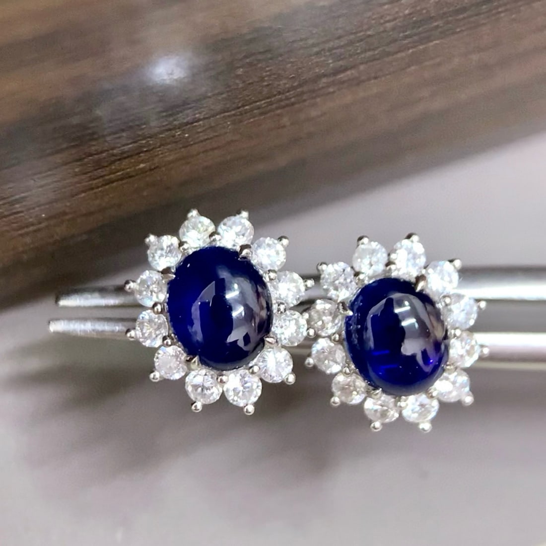 14k Gold 1.63 Ctw Natural Sapphire & Diamond Earrings: Ref:231029150 // gold content:14k gold // ring size:7. 25us // // main gemstone:sapphire // shape:oval // carat weight:1. 22ct // color:blue // treatment:natural // cut grade:g // // adjacent