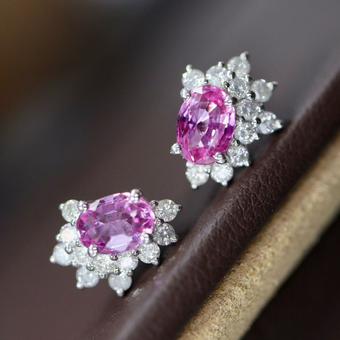 14k Gold 1.47 Ctw Natural Padparadscha Sapphire & Diamond Earrings: Ref:231029181 // gold content:14k gold // main gemstone:padparadscha sapphire // shape:oval // carat weight:1. 03ct // color:pink // treatment:natural // cut grade:g // // adjacent gemstone 2 :