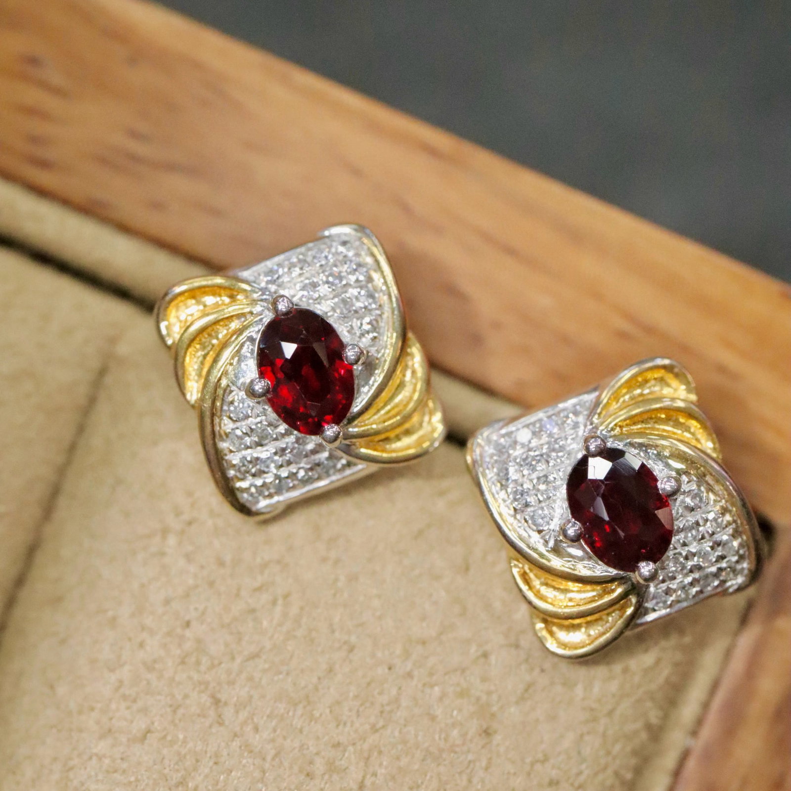 14k Gold 0.53 Ctw Natural Ruby & Diamond Earrings: Ref:231029190 // gold content:14k gold // main gemstone:ruby // shape:oval // carat weight:0. 47ct // color:red // treatment:natural // cut grade:g // // adjacent gemstone 2 : diamond // shape:round