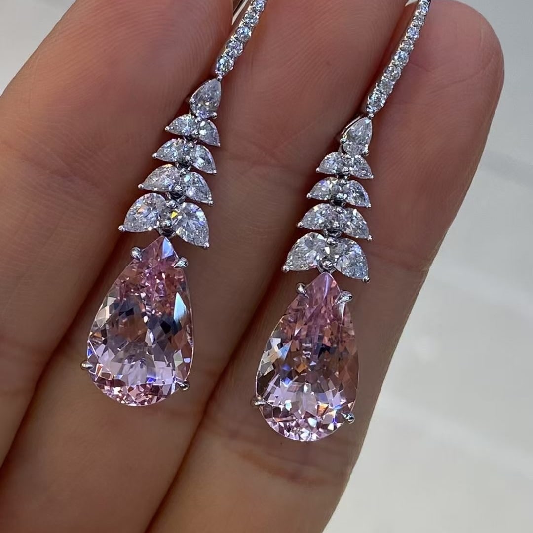 14k Gold 9.76 Ctw Natural Morganite & Diamond Earrings: Ref:231029227 // gold content:14k gold // main gemstone:morganite // shape:pear // carat weight:8. 27ct // color:pink // treatment:natural // cut grade:g // // adjacent gemstone 2 : diamond //