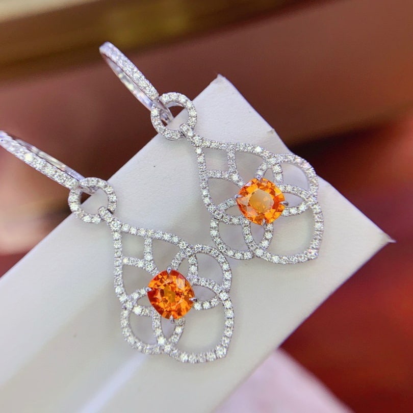 14k Gold 3.78 Ctw Natural Spessartine & Diamond Earrings: Ref:231029234 // gold content:14k gold // main gemstone:spessartine // shape:oval // carat weight:2. 42ct // color:yellow // treatment:natural // cut grade:g // // adjacent gemstone 2 : diamond //
