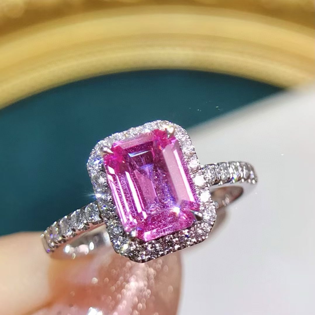 14k Gold 2.21 Ctw Natural Padparadscha Sapphire & Diamond Ring: Ref:231029243 // gold content:14k gold // ring size:7. 25us // // main gemstone:padparadscha sapphire // shape:emerald // carat weight:1. 71ct // color:pink // treatment:natural // cut grade:g // //