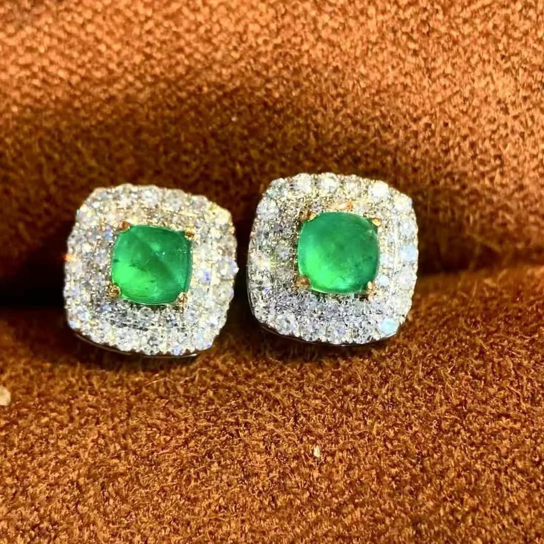 14k Gold 0.61 Ctw Natural Emerald & Diamond Earrings: Ref:231029244 // gold content:14k gold // main gemstone:emerald // shape:suger-loaf // carat weight:0. 35ct // color:green // treatment:natural // cut grade:g // // adjacent gemstone 2 : diamond // sh