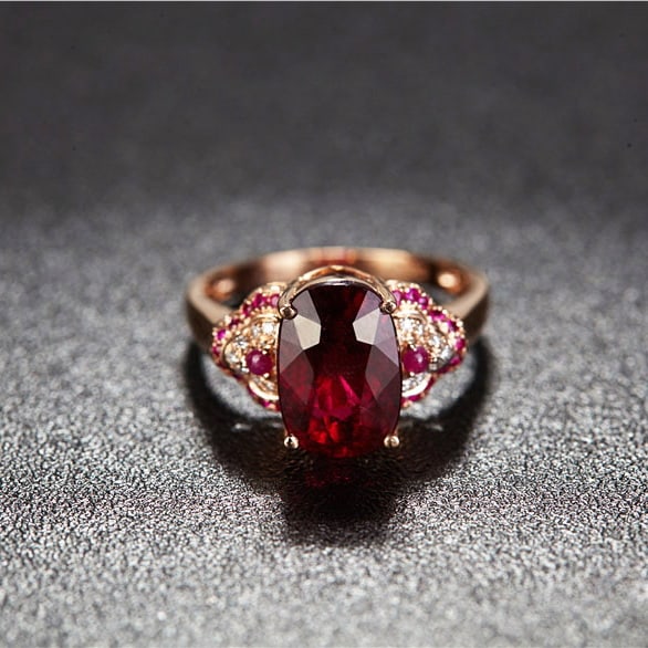 14k Gold 3.9 Ct Natural Tourmaline & Diamond & Ruby Ring: Ref:231030003 // gold content:14k gold // ring size:7. 25us // // main gemstone:tourmaline // shape:oval // carat weight:3. 9ct // color:red // treatment:natural // // adjacent gemstone 2 : diamond //