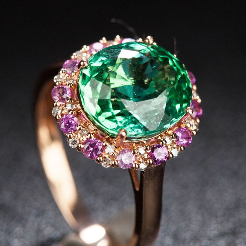 14k Gold 3.95 Ct Natural Tourmaline & Diamond & Sapphire Ring: Ref:231030006 // gold content:14k gold // ring size:7. 25us // // main gemstone:tourmaline // shape:oval // carat weight:3. 95ct // color:green // treatment:natural // // adjacent gemstone 2 :