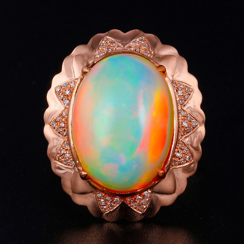 14k Gold 8.15 Ctw Natural Opal & Diamond Ring: Ref:231030010 // gold content:14k gold // ring size:7. 25us // // main gemstone:opal // shape:oval // carat weight:7. 97ct // color:color // treatment:natural // // adjacent gemstone 2 : diamond //