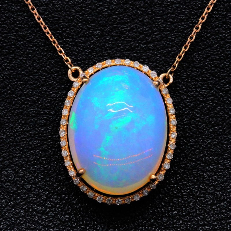 14k Gold 7.01 Ctw Natural Opal & Diamond Necklace: Ref:231030011 // gold content:14k gold // main gemstone:opal // shape:oval // carat weight:6. 9ct // color:color // treatment:natural // // adjacent gemstone 2 : diamond // shape:round // carat
