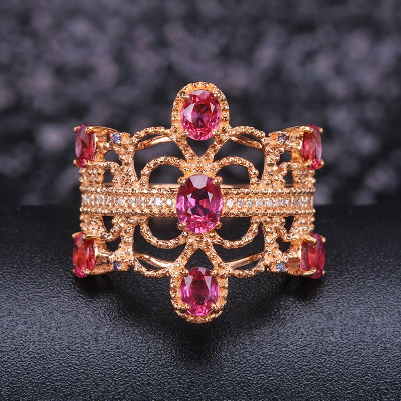 14k Gold 2.14 Ctw Natural Ruby & Diamond Ring: Ref:231030016 // gold content:14k gold // ring size:7. 25us // // main gemstone:ruby // shape:oval // carat weight:2. 06ct // color:red // treatment:natural // // adjacent gemstone 2 : diamond //