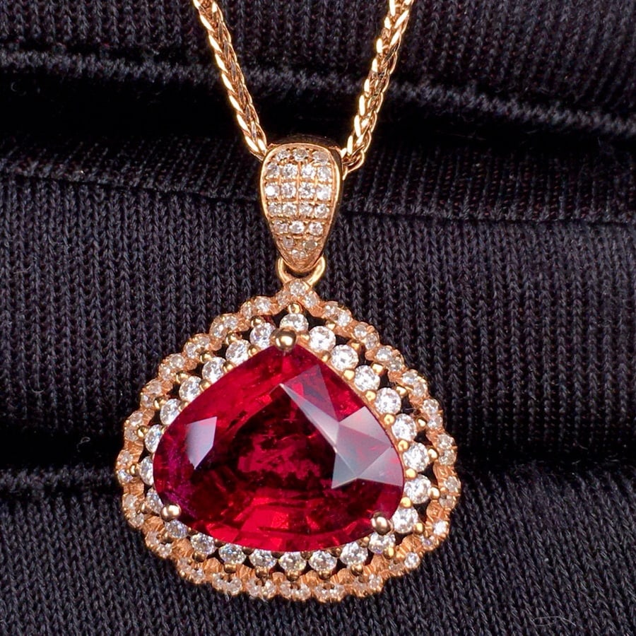 14k Gold 4.3 Ct Natural Tourmaline & Diamond Pendant( Without Chain ): Ref:231030032 // gold content:14k gold // main gemstone:tourmaline // shape:pear // carat weight:4. 3ct // color:red // treatment:natural // // adjacent gemstone 2 : diamond // shape:round // clarity 