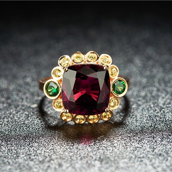 14k Gold 6.3 Ct Natural Tourmaline & Sapphire & Tsavorite Ring: Ref:231030035 // gold content:14k gold // ring size:7. 25us // // main gemstone:tourmaline // shape:cushion // carat weight:6. 3ct // color:red // treatment:natural // // adjacent gemstone 2 :