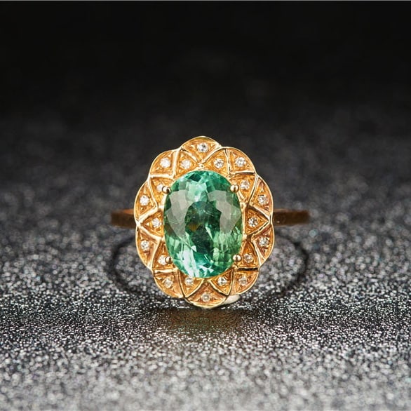 14k Gold 2.7 Ct Natural Tourmaline & Diamond Ring: Ref:231030037 // gold content:14k gold // ring size:7. 25us // // main gemstone:tourmaline // shape:oval // carat weight:2. 7ct // color:green // treatment:natural // // adjacent gemstone 2 : diamond