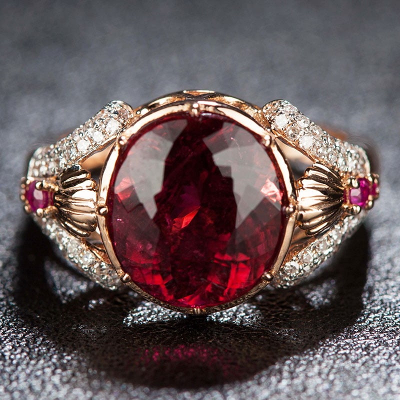 14k Gold 4.95 Ct Natural Tourmaline & Diamond Ring: Ref:231030038 // gold content:14k gold // ring size:7. 25us // // main gemstone:tourmaline // shape:oval // carat weight:4. 95ct // color:red // treatment:natural // // adjacent gemstone 2 : diamond /