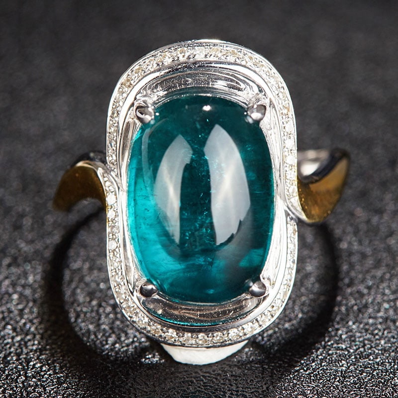 14k Gold 9.45 Ct Natural Tourmaline & Diamond Ring: Ref:231030040 // gold content:14k gold // ring size:7. 25us // // main gemstone:tourmaline // shape:oval // carat weight:9. 45ct // color:blue // treatment:natural // // adjacent gemstone 2 : diamond 
