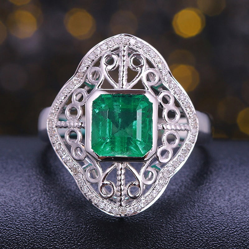 14k Gold 2.29 Ctw Vivid Green Natural Emerald & Diamond Ring: Ref:231030049 // gold content:14k gold // ring size:7. 25us // // main gemstone:emerald // shape:octagonal // carat weight:2. 10ct // color:vivid green // treatment:natural // // adjacent gemstone 2 :