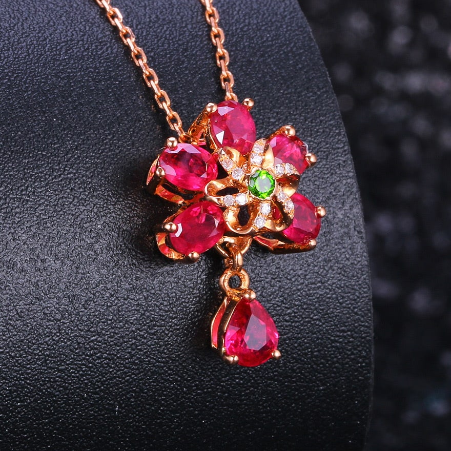 14k Gold 1.49 Ct Natural Ruby & Diamond & Tsavorite Pendant( Without Chain ): Ref:231030057 // gold content:14k gold // main gemstone:ruby // shape:multiply // carat weight:1. 49ct // color:red // treatment:natural // // adjacent gemstone 2 : diamond // shape:round // clarity