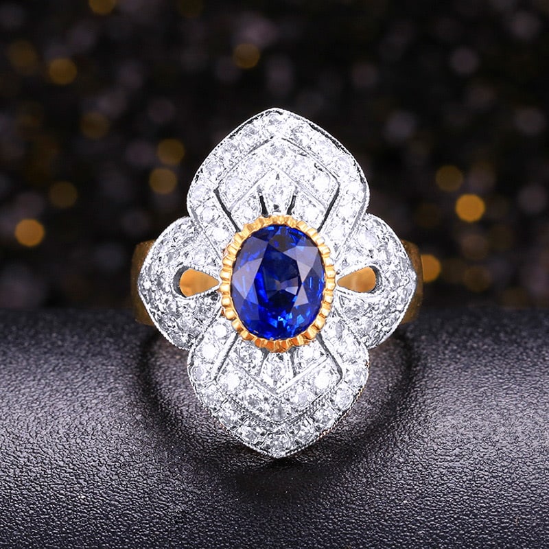 14k Gold 2.4 Ctw Natural Sapphire & Diamond Ring: Ref:231030058 // gold content:14k gold // ring size:7. 25us // // main gemstone:sapphire // shape:oval // carat weight:2ct // color:blue // treatment:natural // // adjacent gemstone 2 : diamond //