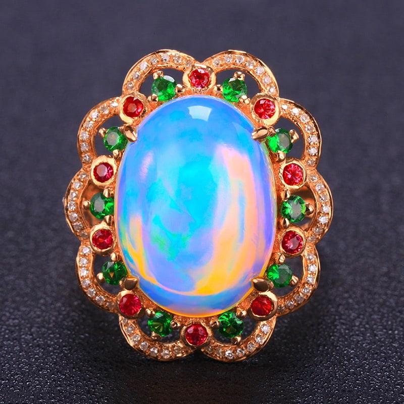14k Gold 7.62 Ct Natural Opal & Diamond & Ruby & Tsavorite Ring: Ref:231030064 // gold content:14k gold // ring size:7. 25us // // main gemstone:opal // shape:oval // carat weight:7. 62ct // color:color // treatment:natural // // adjacent gemstone 2 : diamond //