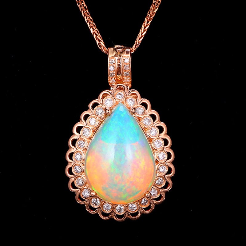 14k Gold 4.39 Ctw Natural Opal & Diamond Pendant( Without Chain ): Ref:231030065 // gold content:14k gold // main gemstone:opal // shape:pear // carat weight:4. 13ct // color:color // treatment:natural // // adjacent gemstone 2 : diamond // shape:round // carat