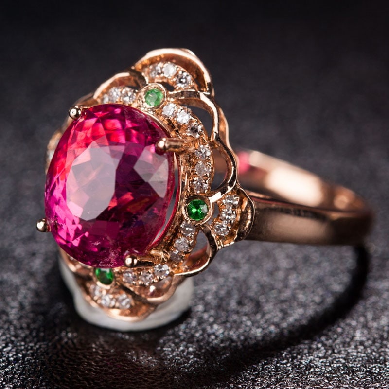 14k Gold 3.6 Ct Natural Tourmaline & Diamond & Tsavorite Ring: Ref:231030091 // gold content:14k gold // ring size:7. 25us // // main gemstone:tourmaline // shape:oval // carat weight:3. 6ct // color:red // treatment:natural // // adjacent gemstone 2 : diamond