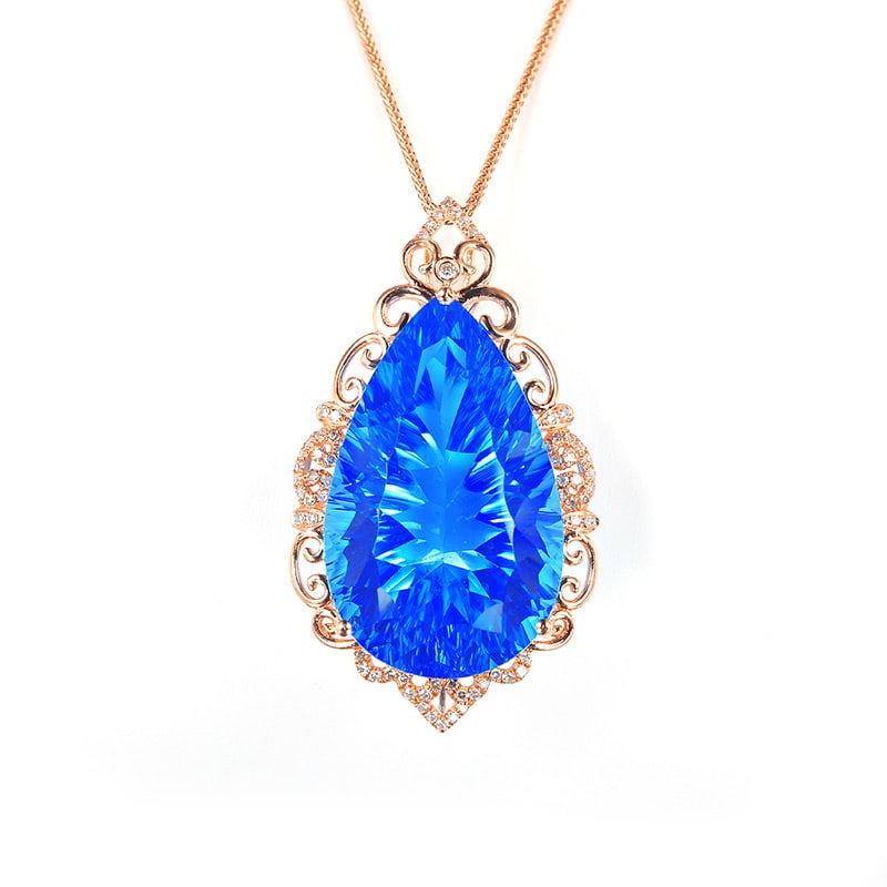 14k Gold 29.42 Ct Natural Topaz & Diamond Pendant( Without Chain ): Ref:231030107 // gold content:14k gold // main gemstone:topaz // shape:pear // carat weight:29. 42ct // color:blue // treatment:natural // // adjacent gemstone 2 : diamond // shape:round // clarity