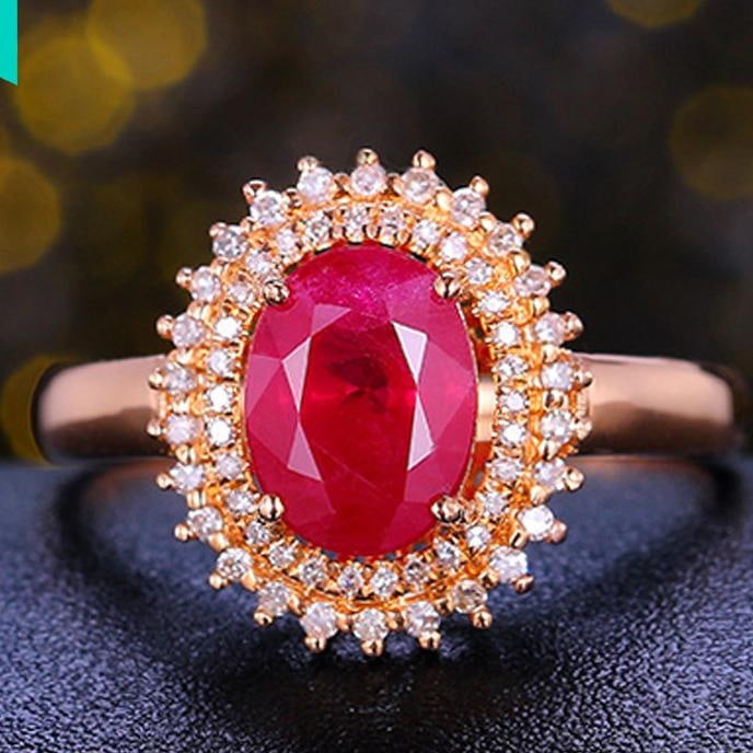 14k Gold 2.31 Ctw Natural Ruby & Diamond Ring: Ref:231030112 // gold content:14k gold // ring size:7. 25us // // main gemstone:ruby // shape:oval // carat weight:2. 09ct // color:red // treatment:natural // // adjacent gemstone 2 : diamond // shap