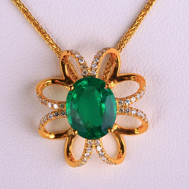 14k Gold 2.69 Ctw Vivid Green Natural Emerald & Diamond Pendant( Without Chain ): Ref:231030118 // gold content:14k gold // main gemstone:emerald // shape:oval // carat weight:2. 45ct // color:vivid green // treatment:natural // // adjacent gemstone 2 : diamond // shape:round // ca