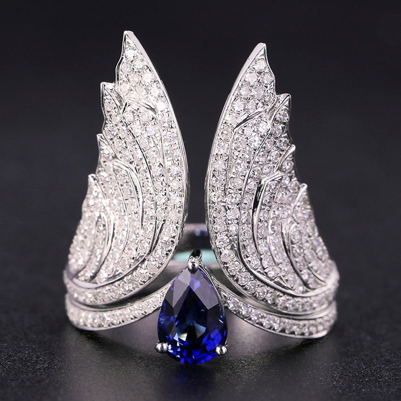 14k Gold 2.32 Ctw Natural Sapphire & Diamond Ring: Ref:231030122 // gold content:14k gold // ring size:7. 25us // // main gemstone:sapphire // shape:pear // carat weight:1. 22ct // color:royal blue // treatment:natural // // adjacent gemstone 2 :