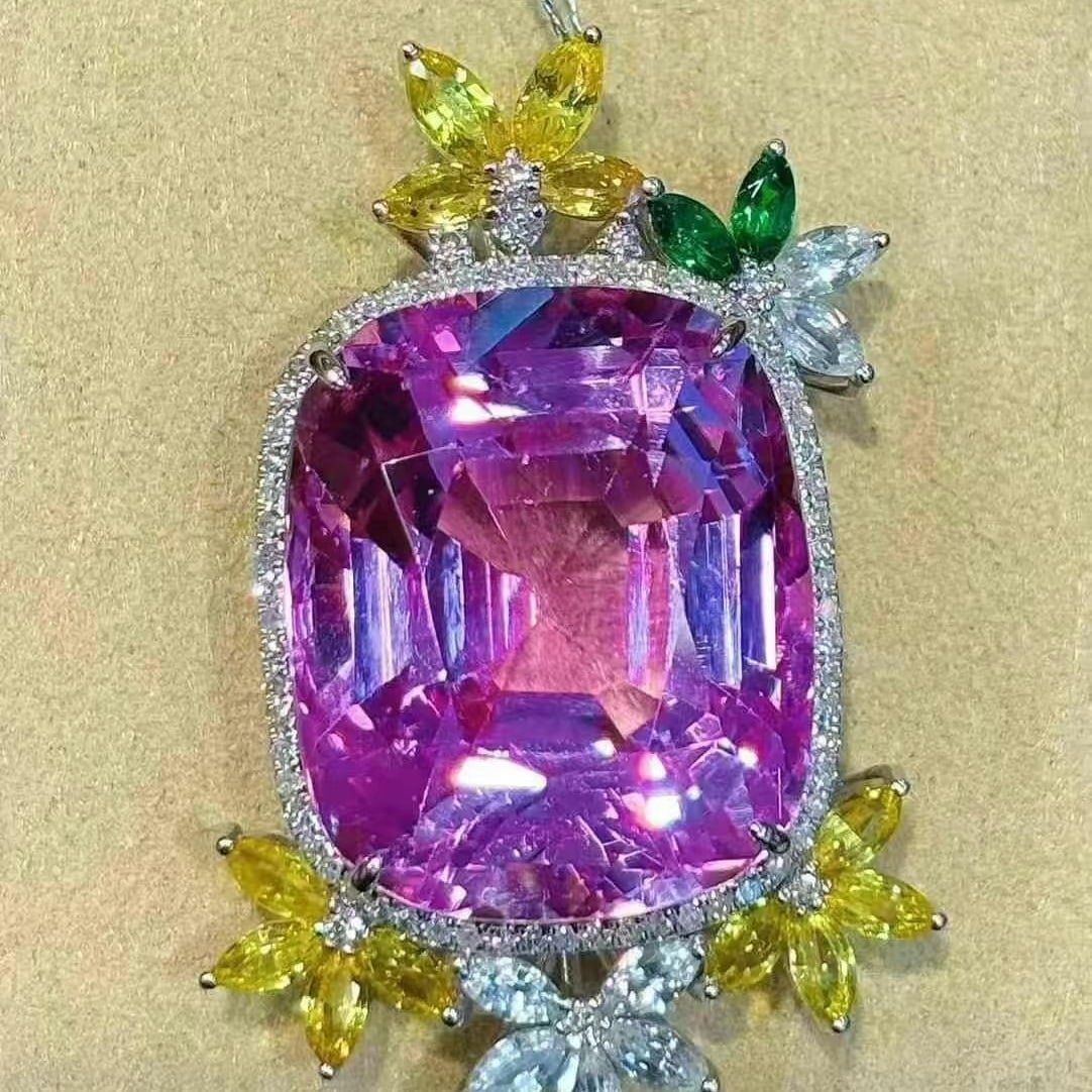 14k Gold 34.86 Ctw Natural Kunzite & Diamond Pendant( Without Chain ): Ref:231030123 // gold content:14k gold // main gemstone:kunzite // shape:cushion // carat weight:34. 5ct // color:purple // treatment:natural // // adjacent gemstone 2 : diamond // shape:round //