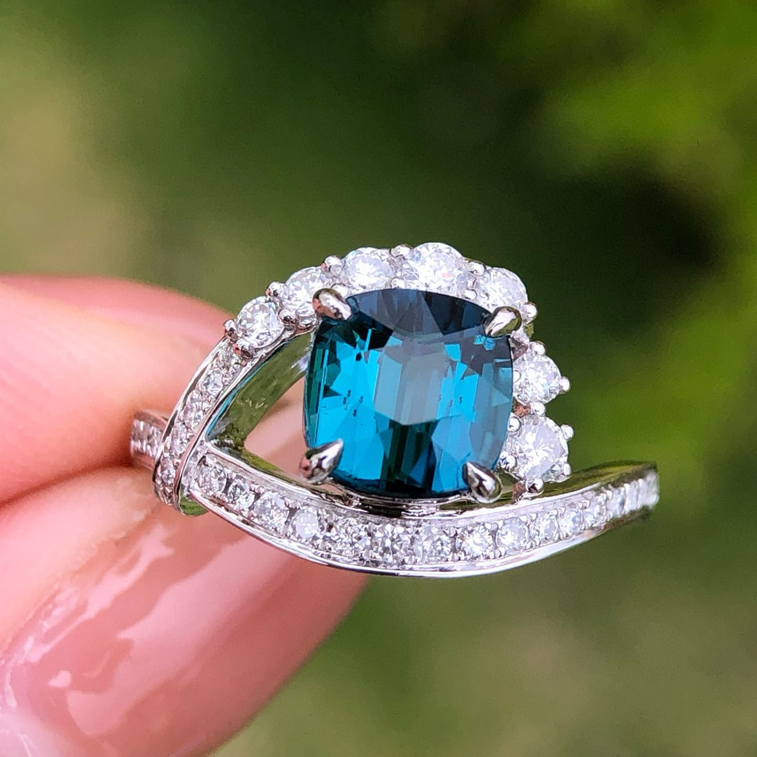 14k Gold 2.1 Ct Natural Tourmaline & Diamond Ring: Ref:231030128 // gold content:14k gold // ring size:7. 25us // // main gemstone:tourmaline // shape:cushion // carat weight:2. 1ct // color:blue // treatment:natural // // adjacent gemstone 2 :