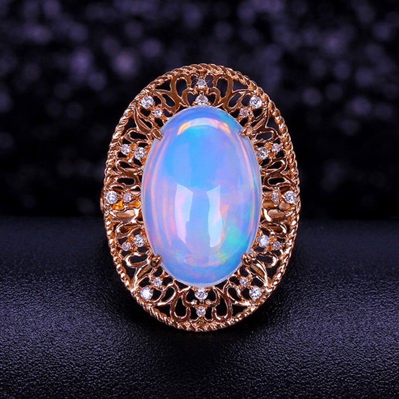 14k Gold 6.23 Ctw Natural Opal & Diamond Ring: Ref:231030156 // gold content:14k gold // ring size:7. 25us // // main gemstone:opal // shape:oval // carat weight:6. 05ct // color:color // treatment:natural // // adjacent gemstone 2 : diamond //