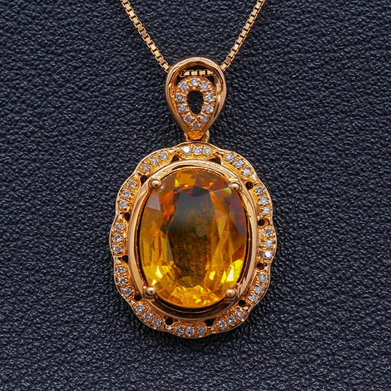 14k Gold 4.69 Ctw Natural Sapphire & Diamond Pendant( Without Chain ): Ref:231030167 // gold content:14k gold // main gemstone:sapphire // shape:oval // carat weight:4. 55ct // color:yellow // treatment:natural // // adjacent gemstone 2 : diamond // shape:round // carat