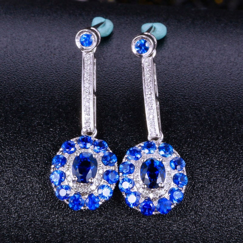 14k Gold 2.64 Ctw Natural Sapphire & Diamond Earrings: Ref:231030170 // gold content:14k gold // main gemstone:sapphire // shape:multiply // carat weight:2. 46ct // color:blue // treatment:natural // // adjacent gemstone 2 : diamond // shape:round //