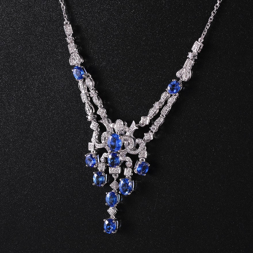 14k Gold 5.22 Ctw Natural Sapphire & Diamond Necklace: Ref:231030175 // gold content:14k gold // main gemstone:sapphire // shape:oval // carat weight:4. 73ct // color:blue // treatment:natural // // adjacent gemstone 2 : diamond // shape:round // carat