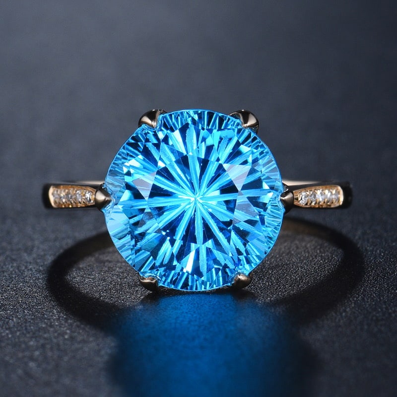 14k Gold 5.66 Ct Natural Topaz & Diamond Ring: Ref:231030194 // gold content:14k gold // ring size:7. 25us // // main gemstone:topaz // shape:round // carat weight:5. 66ct // color:blue // treatment:natural // cut grade:g // // adjacent gemstone