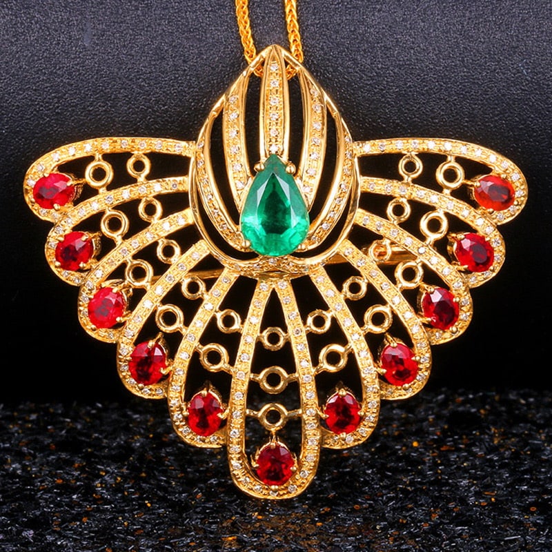14k Gold 3.81 Ctw Natural Emerald & Ruby Brooch/pendant( Without Chain ): Ref:231030225 // gold content:14k gold // main gemstone:emerald // shape:pear // carat weight:1. 20ct // color:green // treatment:natural // // adjacent gemstone 2 : ruby // shape:oval // carat